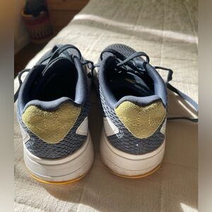 Adidas kids tennis shoes.